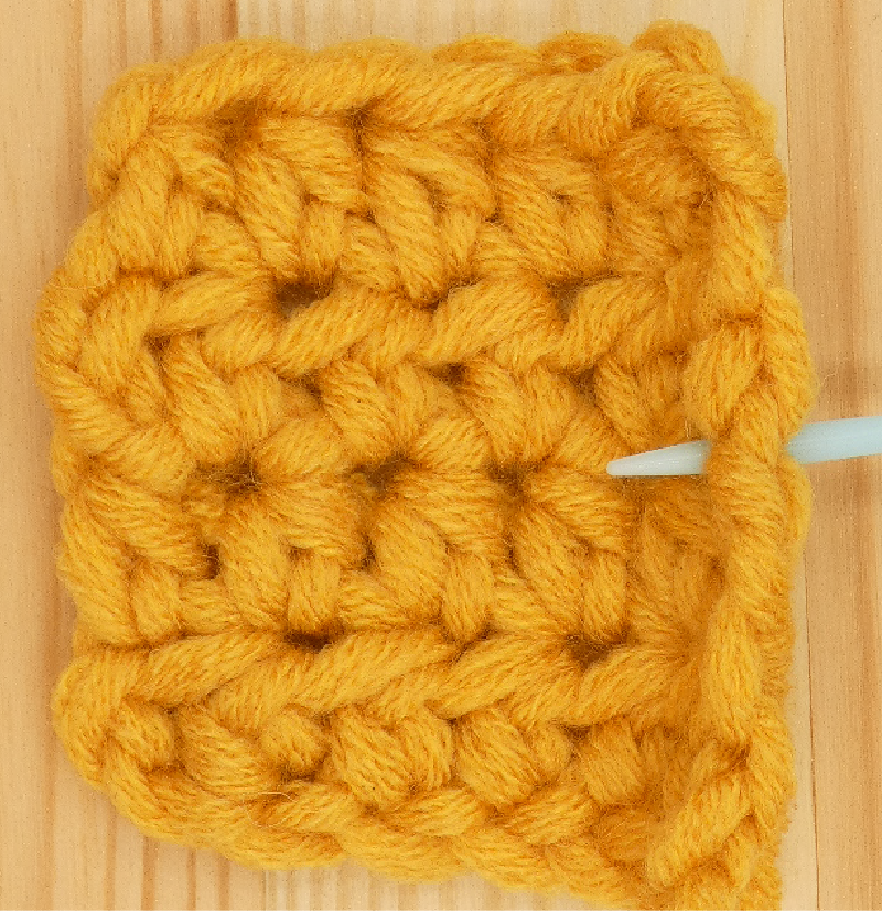 Border Half treble / Half double Crochet photo instructions 2nd side stitch placement loop