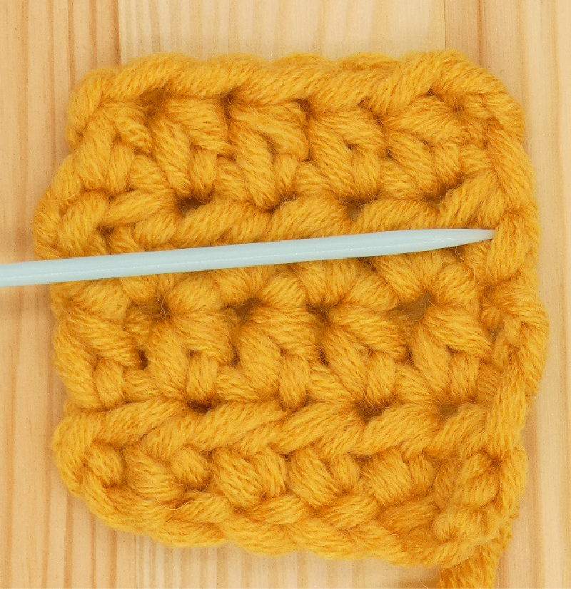 Border Half treble / Half double Crochet photo instructions 3rd side stitch placement front