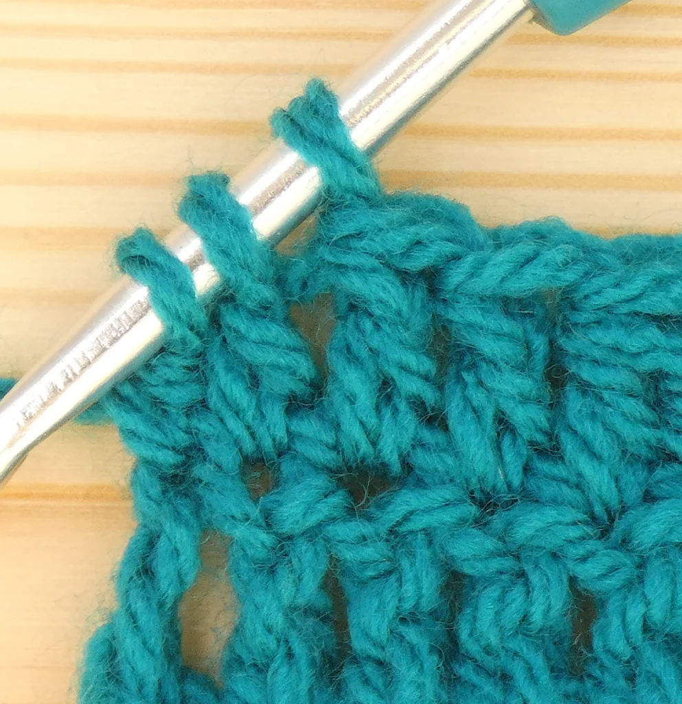 Crochet Decreases - tr Dec end of row 3 loops on hook